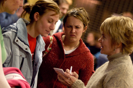 Kathy Southall, director of residence life, takes orders from Freshmen Leah Dumey and Anastasia Vaughn at Union's Homecoming Coffehouse featuring Andrew Peterson. - Photo by Jonathan Blair