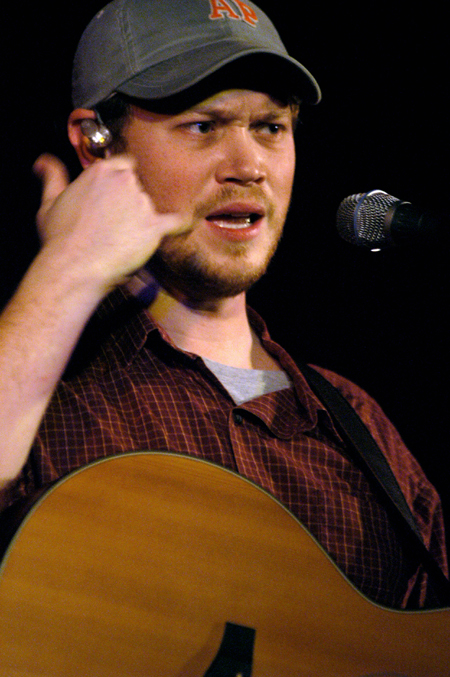 Christian Musician Andrew Peterson tells a story during his performance at Union's Homecoming Coffeehouse. - Photo by Kristen Nicole Sayres
