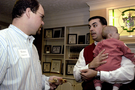 Alums Dwayne Cloar and Brent Housman fellowship at their 10-year reunion during Homecoming 2005. - Photo by Kathleen Murray