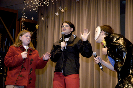 Sophomore Landon Preston joins Seniors Becky Johnson and Jodie Curtis on stage during the Variety Show. - Photo by Kathleen Murray