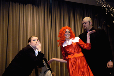 Sophomores Kim Kurz, Jennifer Hamman, and Brandon Thornsberry act out an excerpt from the Broadway musical Annie for the Kappa Delta's large group entry. - Photo by Kathleen Murray