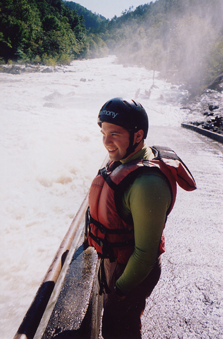 Director of Student Programs Mark VanderHaar takes an excited look at the falls on the Ocoee before departing on the lower half of the river during the Adventure Programs' white water trip. - Photo by Cam Tracy