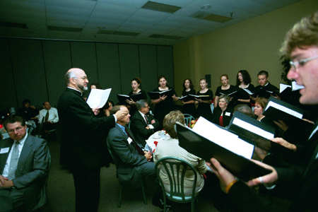 Proclamation, under the direction of Dr. Richard Joiner, performs at the Red Carpet Banquet. - Photo by Jim Veneman