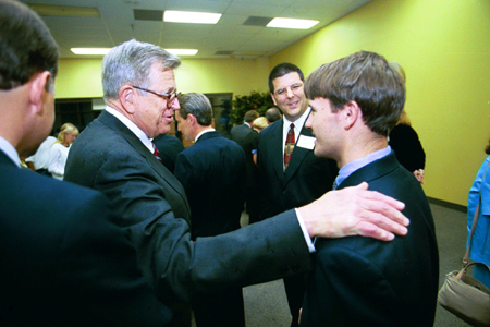 Charles Colson seeks out Freshman Kevin Pratt following the Red Carpet Banquet.  Kevin spoke at the banquet about his experience at the Wedgewood Baptist Church shootings in Fort Worth, TX. - Photo by Jim Veneman