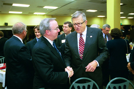 President David S. Dockery and Chuck Colson converse following the Red Carpet Banquet. - Photo by Jim Veneman