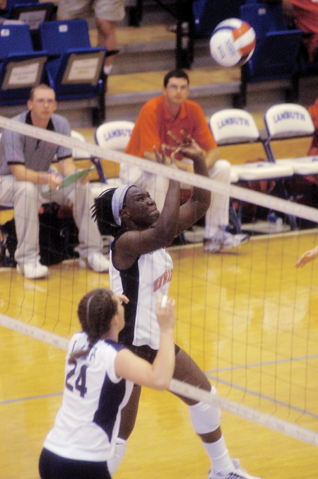 Junior setter Purity Ogolla sets the ball up for the kill against Lambuth on Sept. 13. Union beat Lambuth in five sets for the first of two wins over their cross-town rival this season. - Photo by Brad Moore