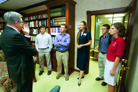 Junior Marc Glass, Sophomore Josh Howerton, Junior Laura Lee Moore, Senior Matthew Glass, and Sophomore Lauren Oldham visit with Chuck Colson prior to his chapel address. - Photo by Jim Veneman