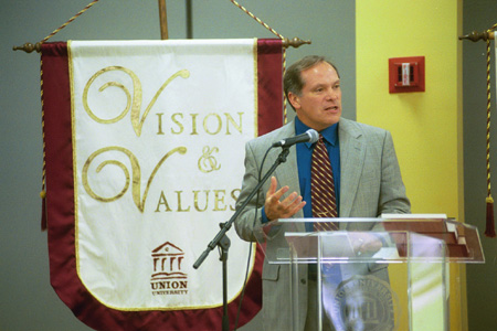 Stan Jones, Wheaton College Provost, speaks at a luncheon with the Union faculty and staff following his chapel address. - Photo by Jim Veneman