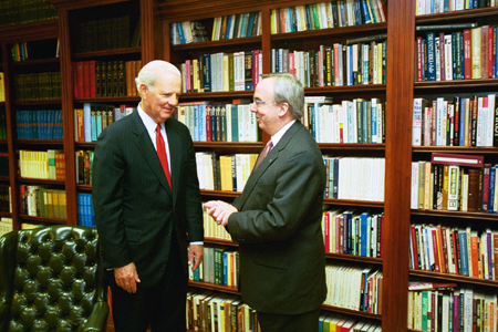 President David S. Dockery and Former Secretary of State James Baker discuss world issues prior to the Scholarship Banquet. - Photo by Jim Veneman