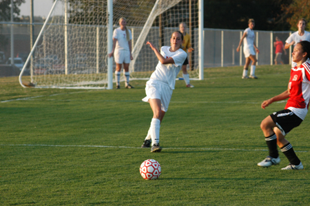 Senior Lendy Wilson clears the ball after a Martin Methodist corner kick. - Photo by Steven Aldridge
