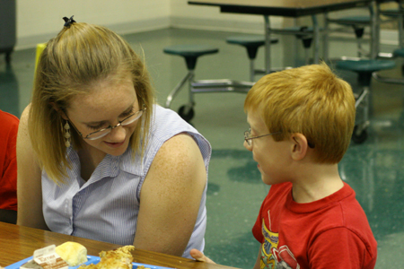 Dana Thompson spent time with students at South Elementary during her Day of Remembrance service project. - Photo by Derek Ownby