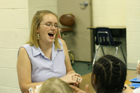 Dana Thompson spent time with students at South Elementary during her Day of Remembrance service project. - Photo by Derek Ownby