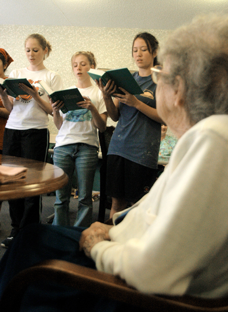 Choral students sang for residents at a nursing home during their Day of Remembrance service project. - Photo by Heather Phillips