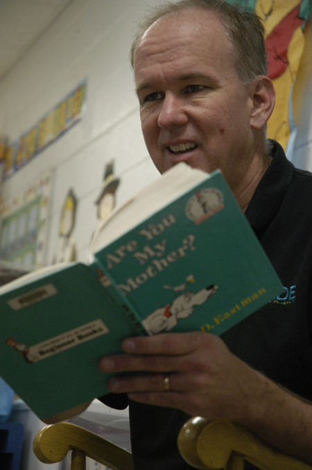 Mark Kahler, associate vice president for university communicaitons, spent his Day of Remembrance at Jackson Christian School reading to children. - Photo by Kathleen Murray