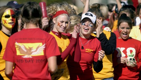 The ladies of Chi Omega cheer their sisters on during the Greek Olympics. - Photo by Kathleen Murray