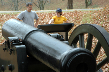 Dr. David Thomas and Jennifer May read a marker that explains a part of the Civil War battle at Fort Donelson after their Day of Remembrance service project. - Photo by Jim Veneman