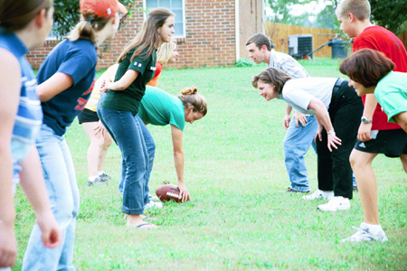 Kappa Delta members and their families get into some football action during Family Weekend 2002. - Photo by Lindsay Stavish