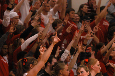 Fans celebrate a three-point basket during the Bulldog's home game against Lambuth. - Photo by Heather Phillips