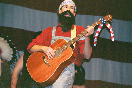 Sophomore John Reed plays the guitar during the SAC Variety Show.
 - Photo by Lindsay Stavish