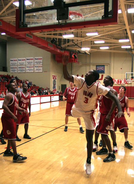 Kinley Sellers (3) lands awkwardly after a shot attempt in Union's 74-63 win over Cumberland. - Photo by Kyle Kurlick