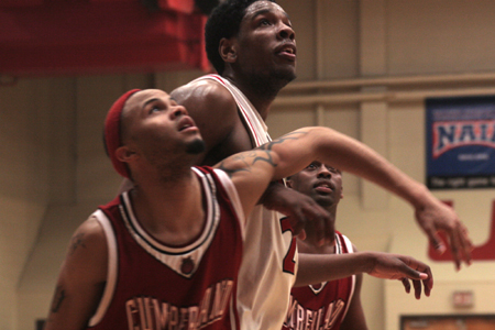 Deywane Lee works against a Cumberland player for rebounding position during a free throw attempt. - Photo by Kyle Kurlick