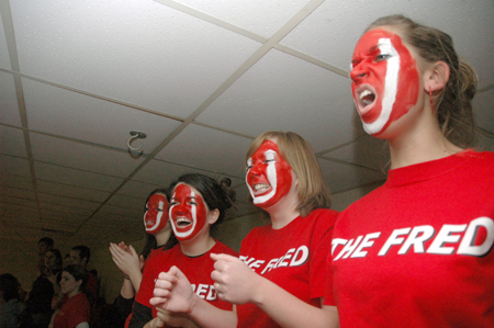 Jennifer Tharpe, Keely Hart, Bethany Hobbs, Janelle Musser show their bulldog spirit at the Lambuth away game. - Photo by Brad Moore