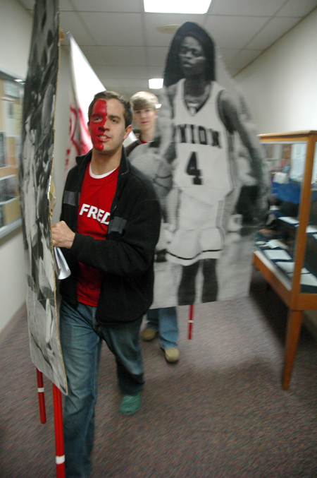 Senior Landon Preston leads a pack of Fred Fanatics to the Lambuth game. - Photo by Brad Moore