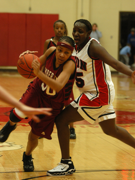 D.J. Sissoko tries to stop the Cumberland player from driving to the basket.  - Photo by Heather Phillips