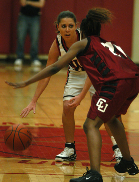 Jennifer Henson handles the ball while being guarded by a Cumberland player.  - Photo by Heather Phillips