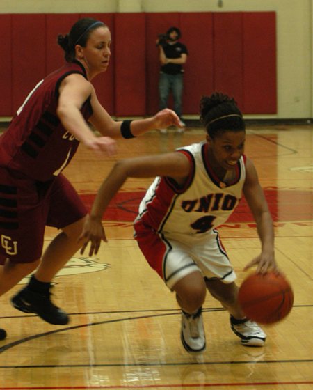 Jessica Graves (4) drives past a Cumberland defender to get to the basket.   - Photo by Heather Phillips