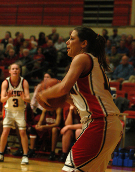 Jennifer Henson gets set for a shot as Crystal Eason (3) gets ready to receive a pass in a Union basketball game.  - Photo by Heather Phillips