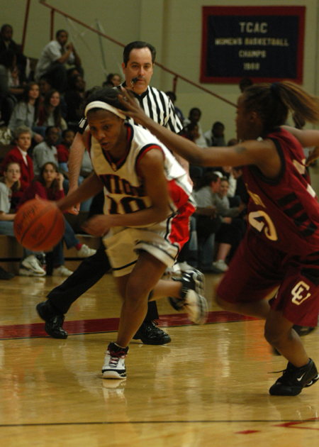 Senior Ena Daniels (10) tries to dribble past a defender in a game versus Cumberland.   - Photo by Heather Phillips