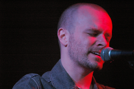 INO recording artist Derek Webb performs at the Homecoming Coffeehouse. - Photo by Brad Moore