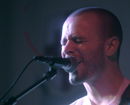 INO recording artist Derek Webb performs at the Homecoming Coffeehouse. - Photo by Stephanny Rodriguez