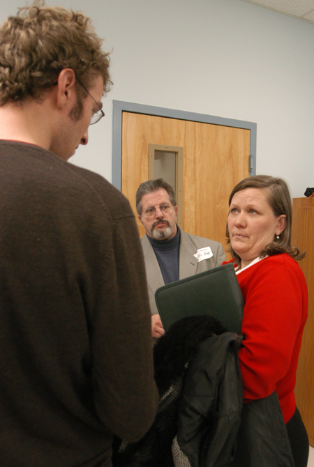 Margaretha Eudy and her husband Ken speak with Hunter Stepp after the Alumni Conference on the Sciences, an annual Homecoming event. - Photo by Heather Phillips