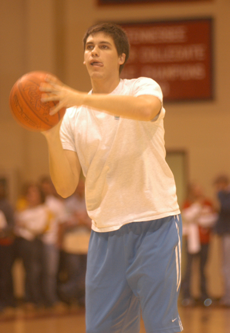 Senior Casey Stafford shooting a basket enroute to his win of the Best Men's Three-point Shooter competition. - Photo by Jim Veneman