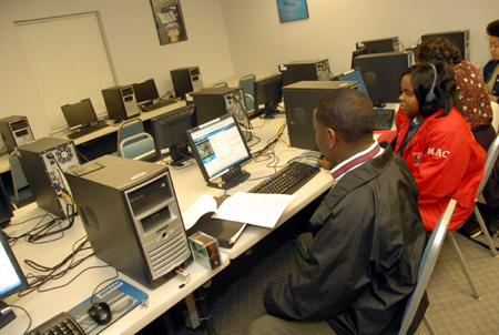 Students on the Germantown campus utilize the computer lab on the second floor of the building. - Photo by Morris Abernathy