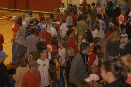Excited student basketball fans prepare for the activities of Midnight Madness. - Photo by Jim Veneman