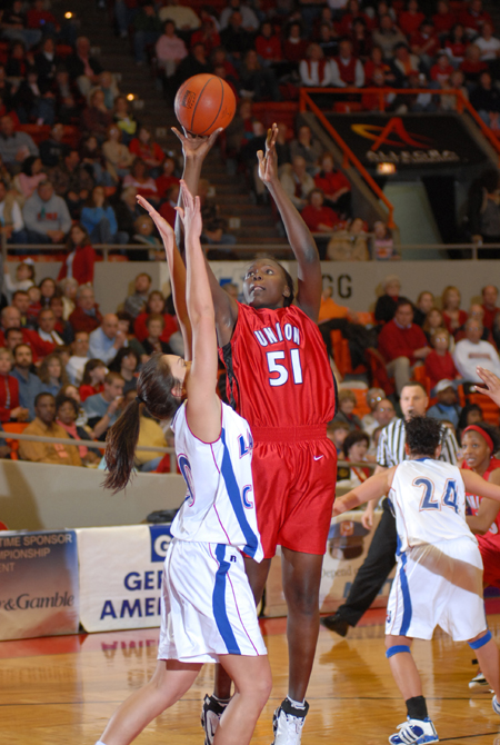 Josephine Owino (51) towers above the Lubbock Christian defense during the NAIA Women's Basketball National Championship Game. - Photo by Morris Abernathy