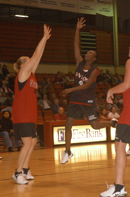 Junior Christal Merriweather (No. 25) drives in during the Lady Bulldog scrimmage. - Photo by Jim Veneman