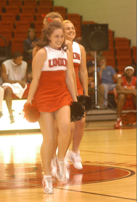 The Union Cheerleaders led the crowd in cheers during Midnight Madnesss. - Photo by Jim Veneman