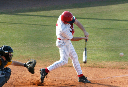 Senior Jeffrey Jackson making contact during a Union win over Spalding University. - Photo by Steven Aldridge