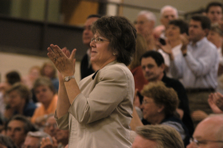 Assistant Dean of Education, Dottie Myatt, stands to cheer with Union students, faculty, staff, boosters, and fans during the April 7 celebration to honor the Lady Bulldog's 2006 NAIA National Championship. - Photo by Heather Phillips