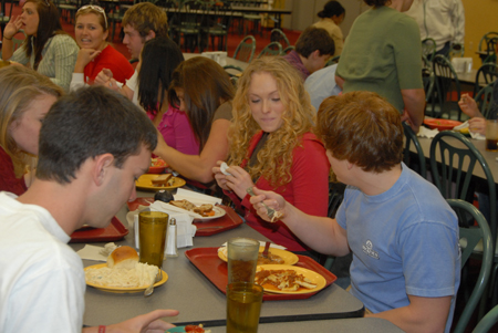 Will Hayden and Robbie Wright fellowship in the cafeteria. - Photo by Morris Abernathy