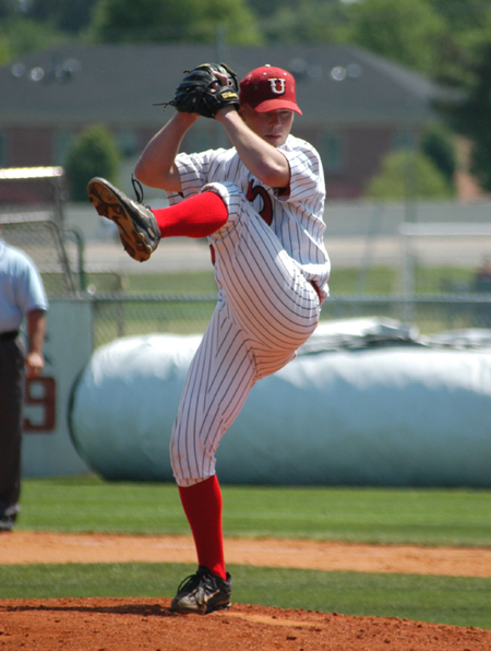 Junior pitcher Clint Arthur starts in windup during a game versus Cumberland at Union's Fesmire Field. - Photo by Steven Aldridge