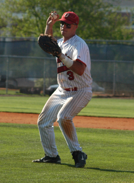 Junior first baseman Garrett Pepper fields a grounder and sets himself for a toss to first base. - Photo by Steven Aldridge
