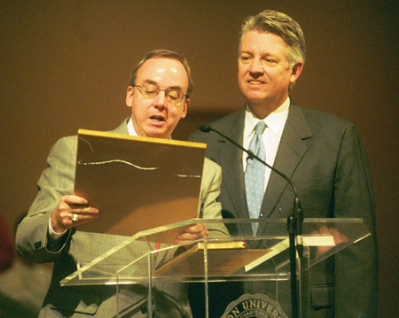 President David S. Dockery present SBC President Jack Graham with a certificate of installation to the R.G. Lee Society of Fellows. - Photo by Jim Veneman