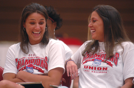 Lady Bulldogs Merideth Richardson (left) and Jennifer Henson, both of Bradford, Tennessee, enjoy the celebration held in honor of the 2006 NAIA National Championship won Union. - Photo by Kristen Nicole Sayres