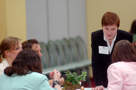 Christian Ethics senior Jill Zimmer interacts with fellow Scholarship Symposium participants at the reception. - Photo by Kyle Kurlick