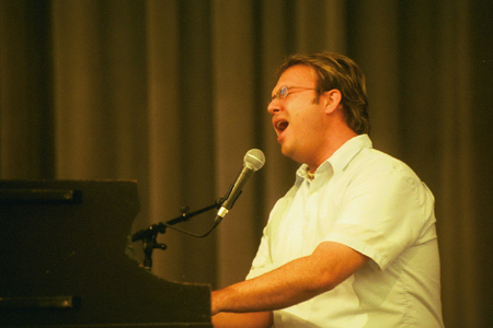 A member of the praise band from the People's Church in Franklin, TN leads in worship at the 2002 Pastors' School. - Photo by Jim Veneman